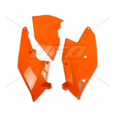Komplet plastikowych osłon bocznych tylnych UFO KTM SX SXF 16-18 EXC EXCF 17-19 z pokrywą filtra pomarańczowe (KT04062127) Komplet plastikowych osłon bocznych tylnych UFO KTM SX SXF 16-18 EXC EXCF 17-19 z pokrywą filtra pomarańczowe (KT04062127)
